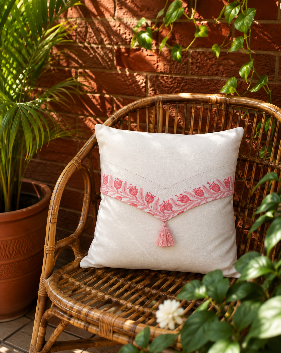 Pure cotton cushion cover with embroidered border and tassel detail