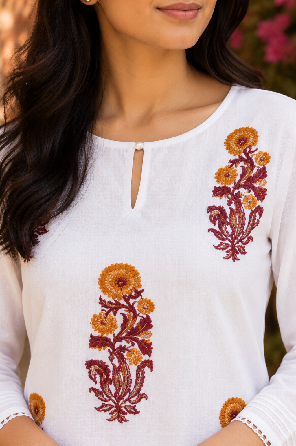 Close-up of hand block printed floral motif on white kurta