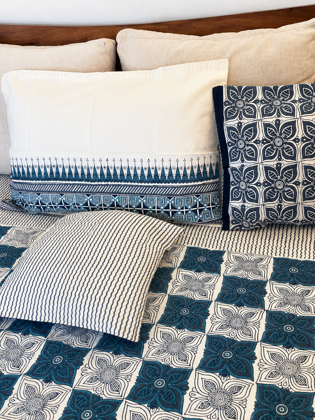 Hand block printed indigo tile bedcover set – close up detail with cushions
