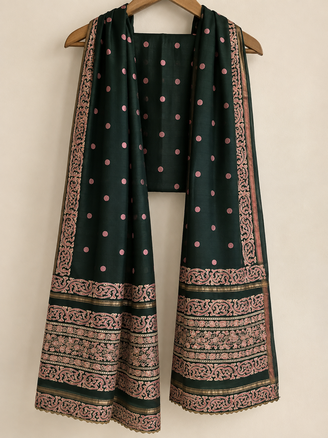 Full view of forest-green dupatta with pink and gold-toned patterned border