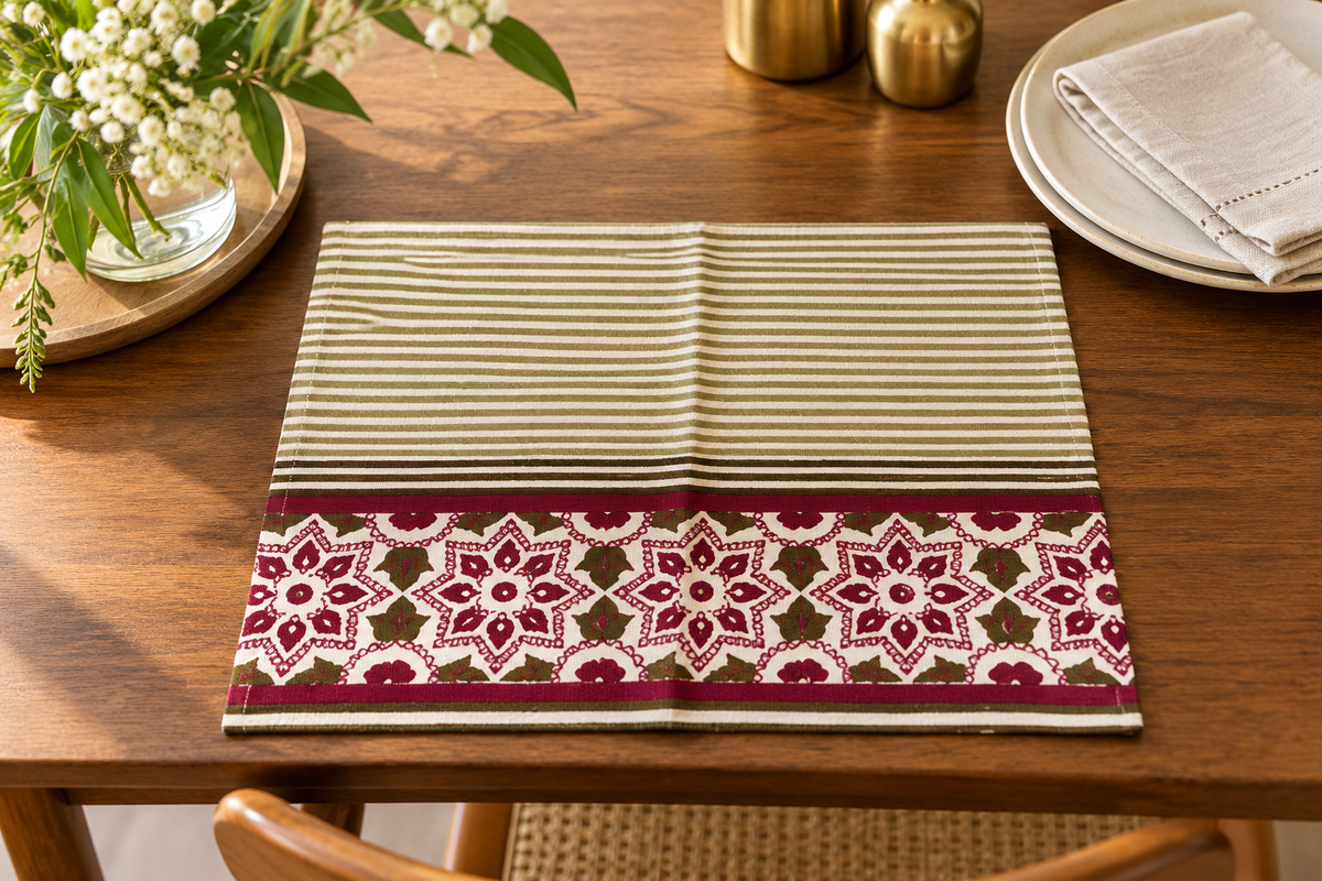 Front view of olive and ivory striped placemat with maroon floral border
