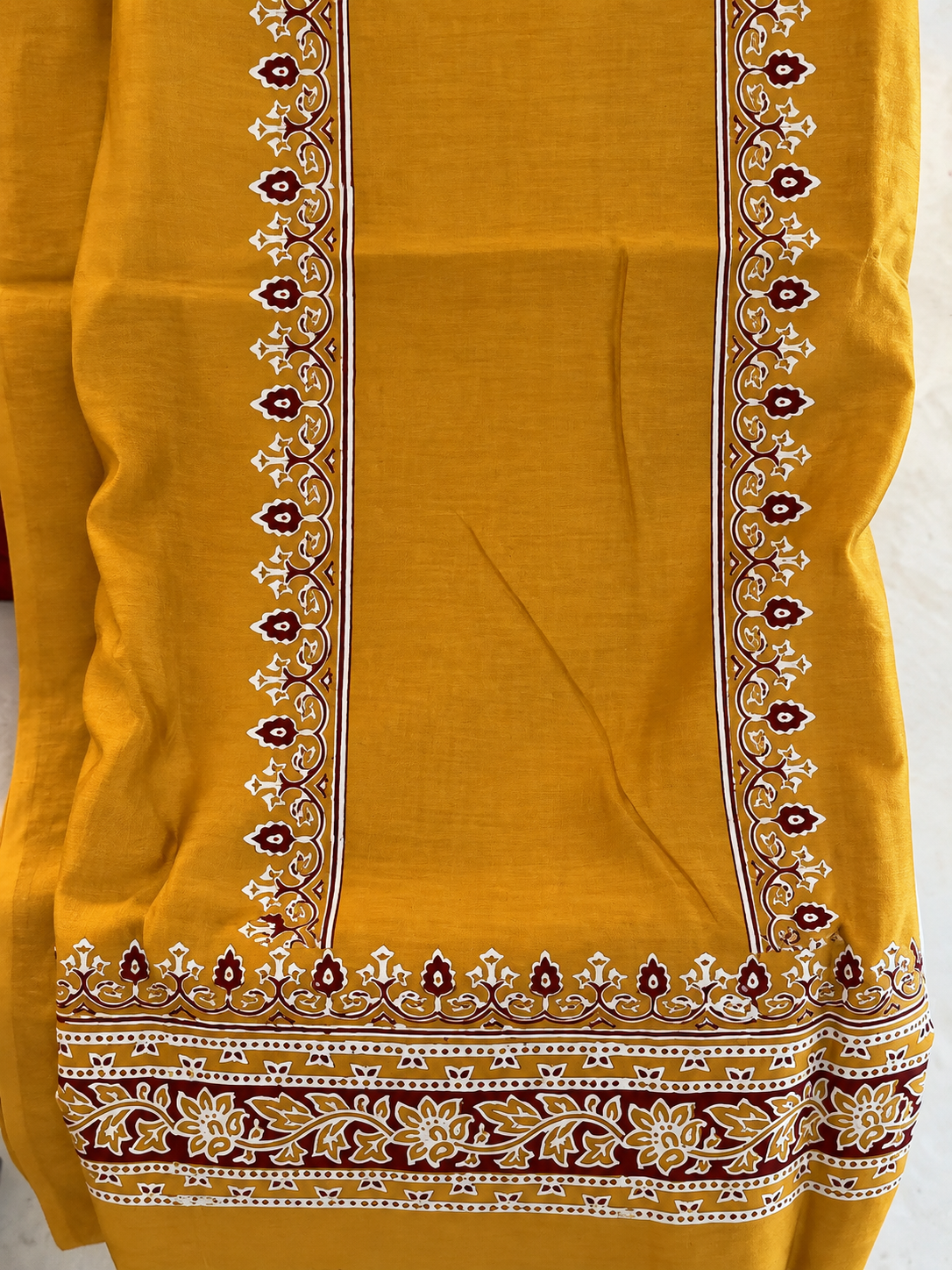 Mustard yellow suit fabric border details